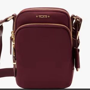 NWT Tumi Ruma Voyageur crossbody bag maroon